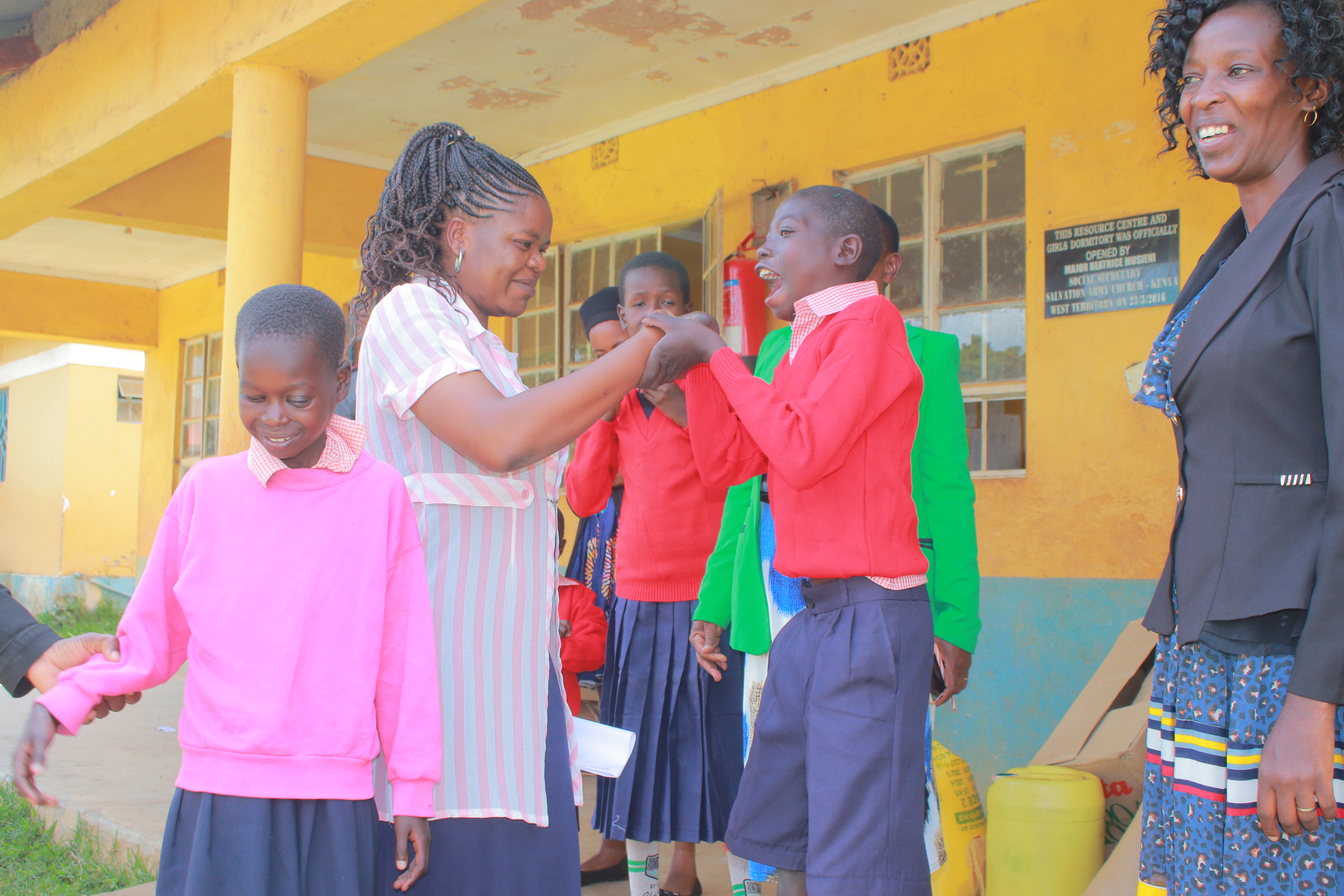 Visually impaired girl studying with adaptive materials